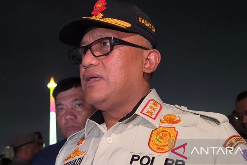 satpol pp jukir liar di monas disebabkan parkiran kurang memadai