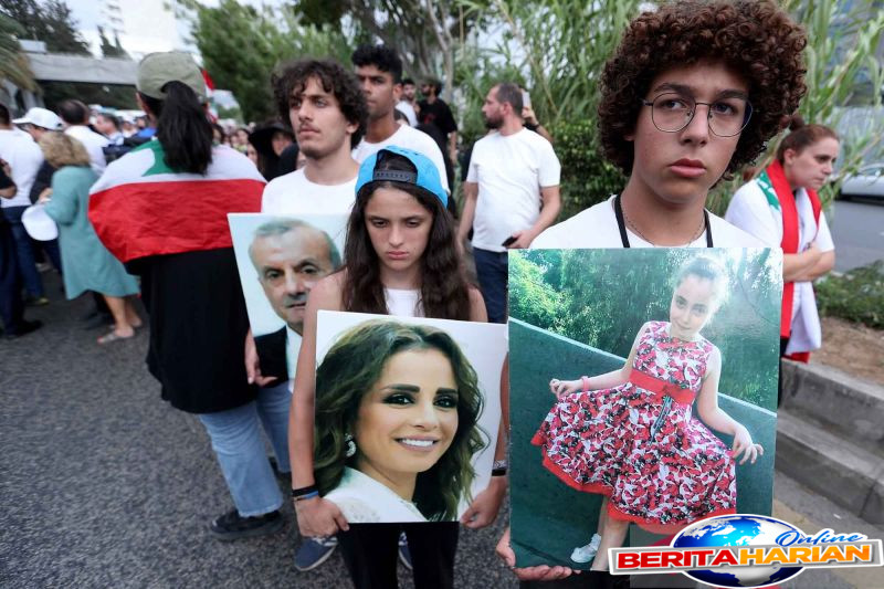 Masyarakat Lebanon Mengenang Tragedi Ledakan 2020 dengan Berjalan Menuju Pelabuhan Beirut 1 warga lebanon kenang tragedi ledakan 2020 dengan berpawai ke pelabuhan beirut